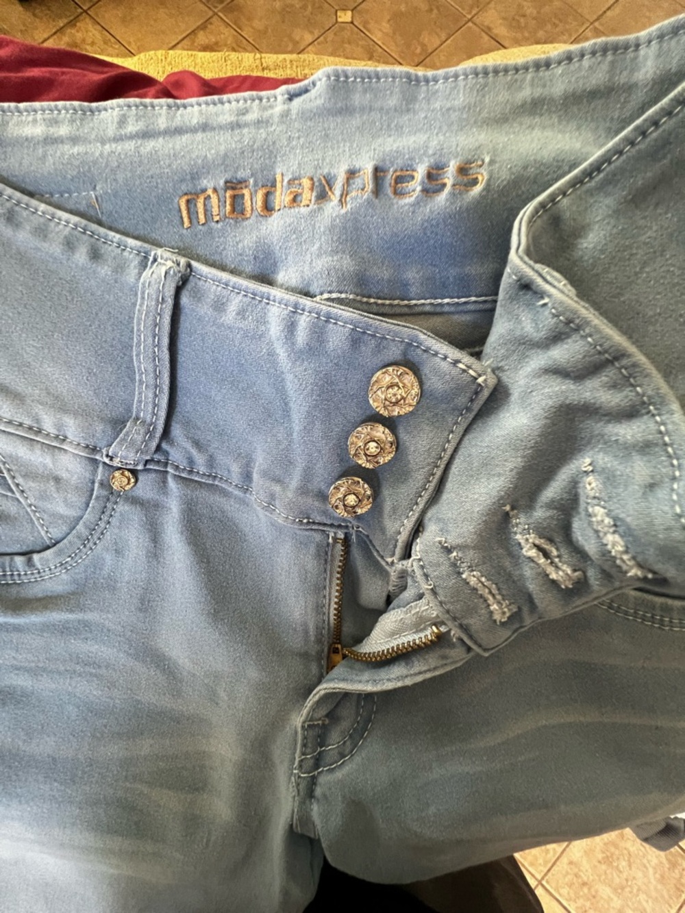 Light Blue Women’s Jeans with Decorative Buttons